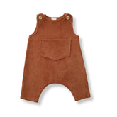 Flat lay of terracotta baby corduroy overalls with front pocket